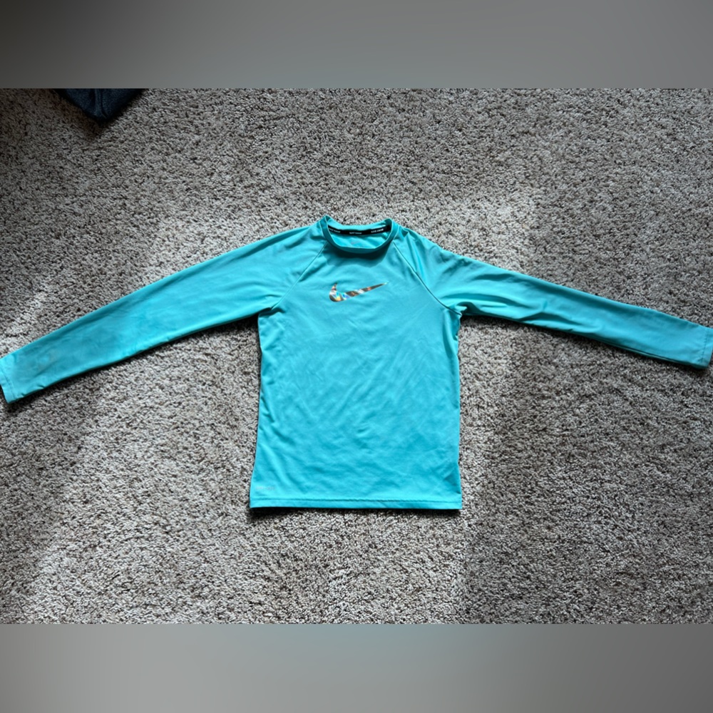 Nike, kids large, teal long sleeve swim top.